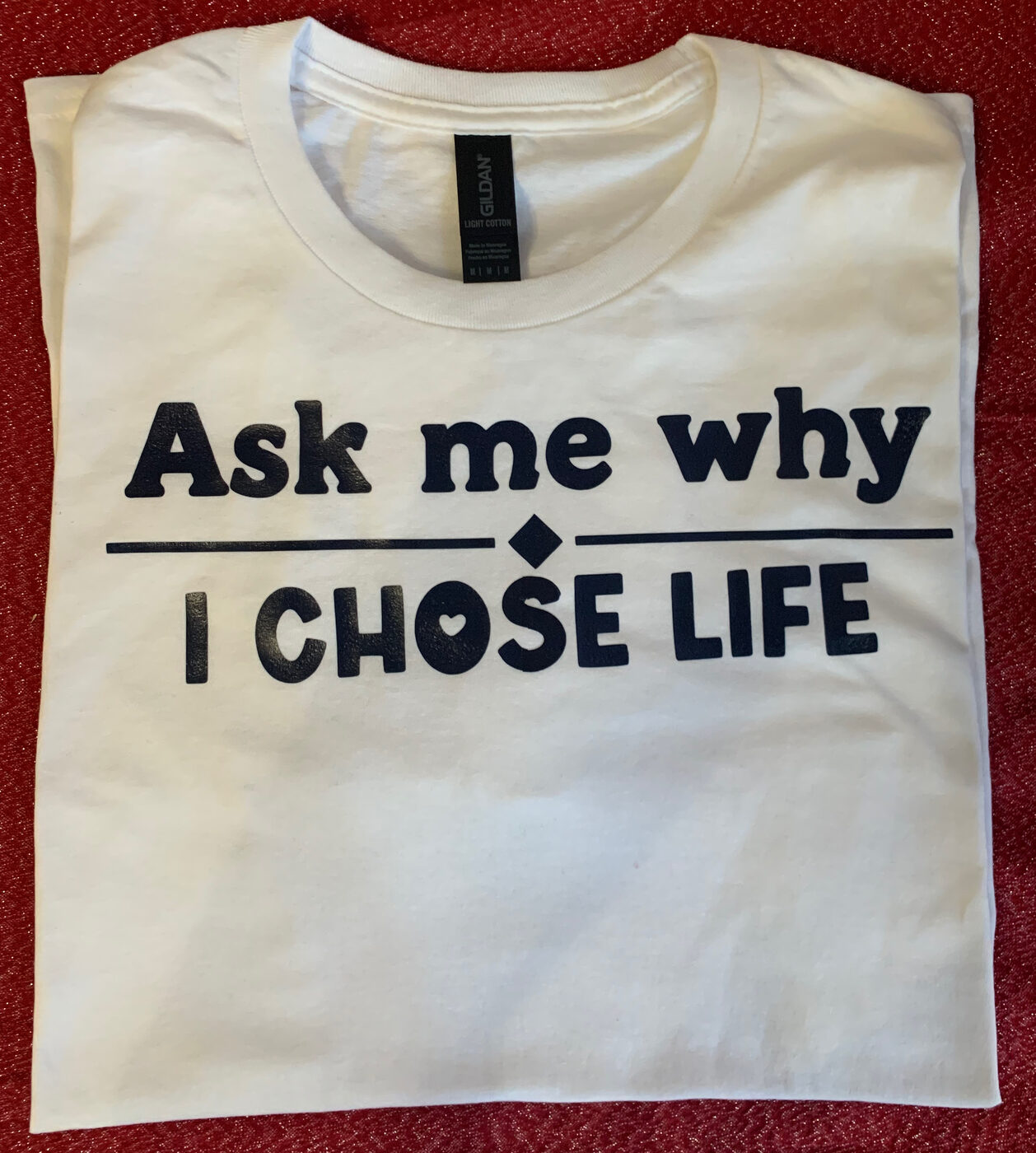 White Freedom Fight Ministries shirt reading "Ask me why — I chose life"